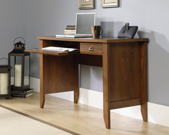 wood-grain computer desk with keyboard tray